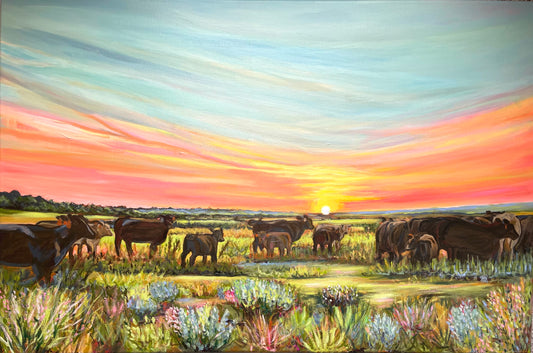 Painting of cows in a field with a colorful sunset sky