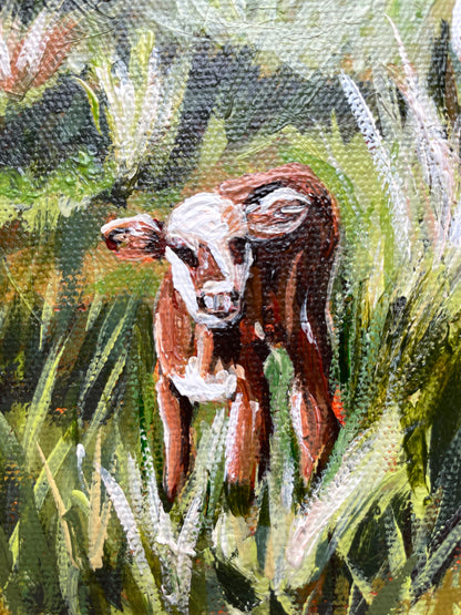 Painting of a baby cow in a natural setting with greenery