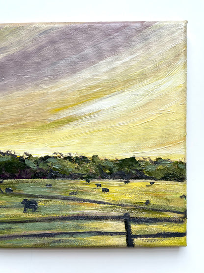 Painting of a landscape with fields, trees, and animals with a purple and yellow sky